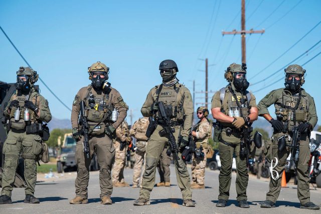 071725_CopsInMasks_01_MichaelOwenBaker